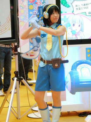 Illustration for article titled 2009's Cosplaying Arcade Game Booth Companions